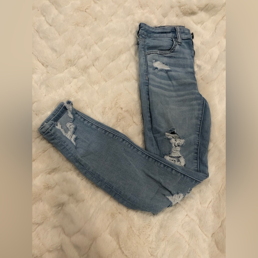 American Eagle Distressed and Ripped High Rise Jegging